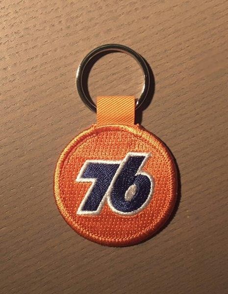 Schlüsselanhänger "76" orange